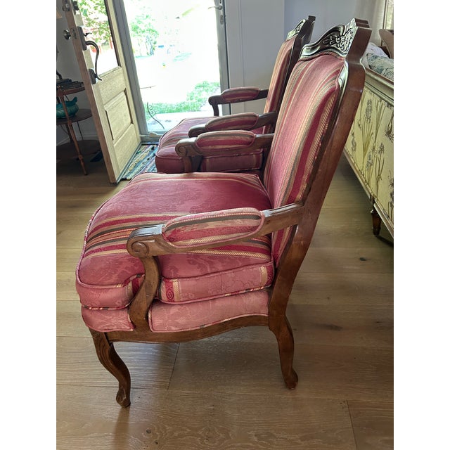 From the 80"s, classic Louis XV Bergére arm chairs with jacquard upholstery in Burgundy Red, Gold, and Green. Excellent...