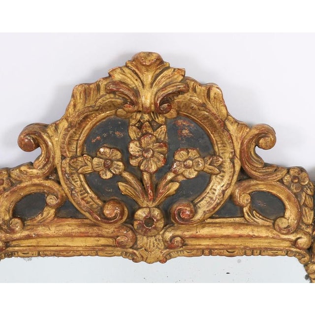 This is a lovely antique French Louis XVI giltwood overmantel mirror, circa 1770 in date. The rectangular shaped frame...