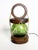 Wooden table lamp with green glass globe, France, 1960s. An elegant French table lamp from the 1960s combining a turned...