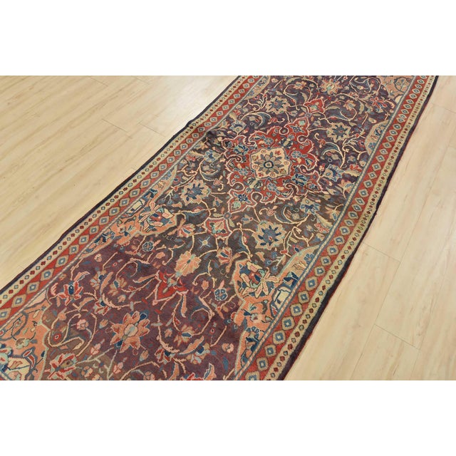 An authentic semi-antique, traditional Malayer runner hand-knotted with fine wool and natural dyes. This beautiful...