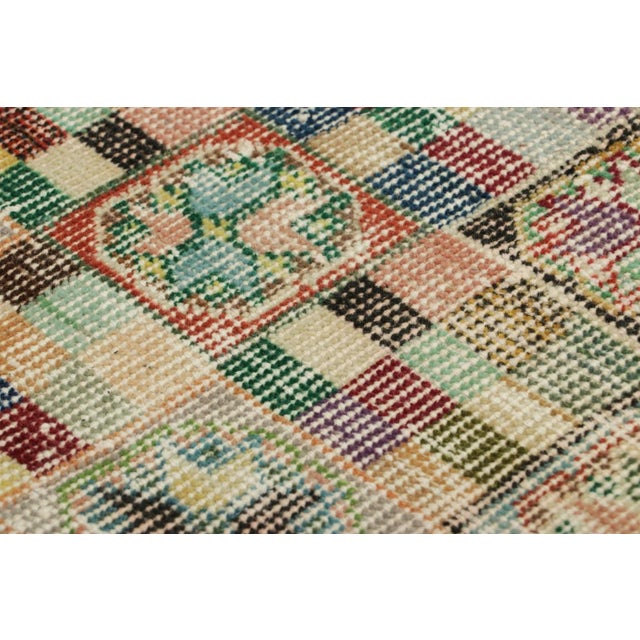 Made with hand-knotted wool and originating from Turkey circa 1960 – 1970, this 2x2 vintage Zeki Müren square rug is a...