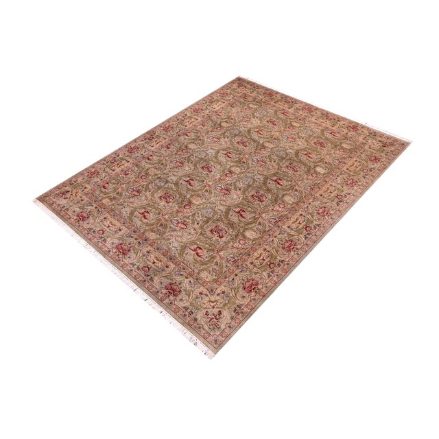 Designed with mesmerizing intricacy and gorgeous color palette, this hand-knotted masterpiece demonstrates the beauty and...