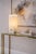 A sculptural “Covet” rechargeable table lamp designed by Kelly Wearstler for Visual Comfort & Co., executed in solid...