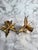 Wonderful vintage pair of solid brass figural poinsettia candlestick holders. Made in India - Circa 1980s.
