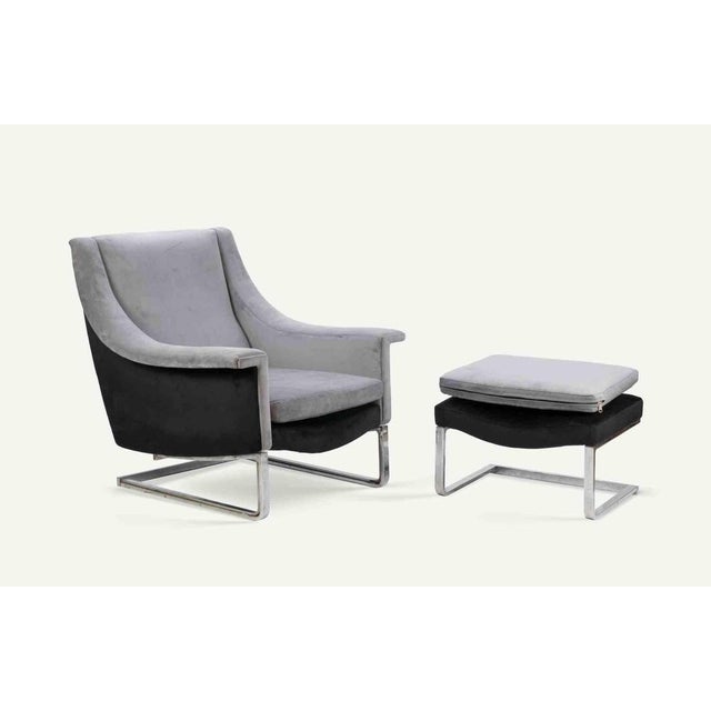 Armchair with Ottoman, realized in Italy in 1970s. Chromed steel and padded velvet. Armchair: 86 x 85 x 78 cm Ottoman: 43...