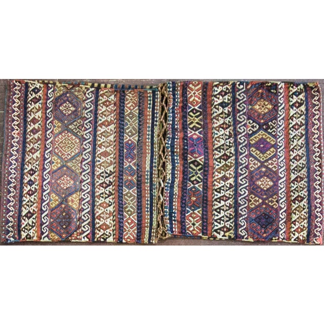 A beautiful antique Shahsavan double saddlebag woven in the intricate sumakh technique and preserved in remarkable...