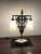 French Art Deco table lamp by Georges Leleu. Having two shades in frosted glass with polished details having geometric...