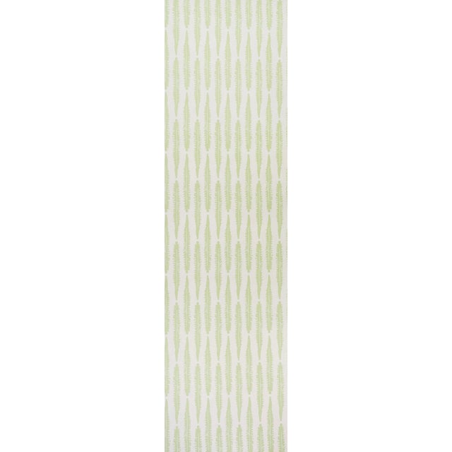 Foliage surrounding her countryside home in England inspired printmaker Molly Mahon to create this graphic wallcovering....