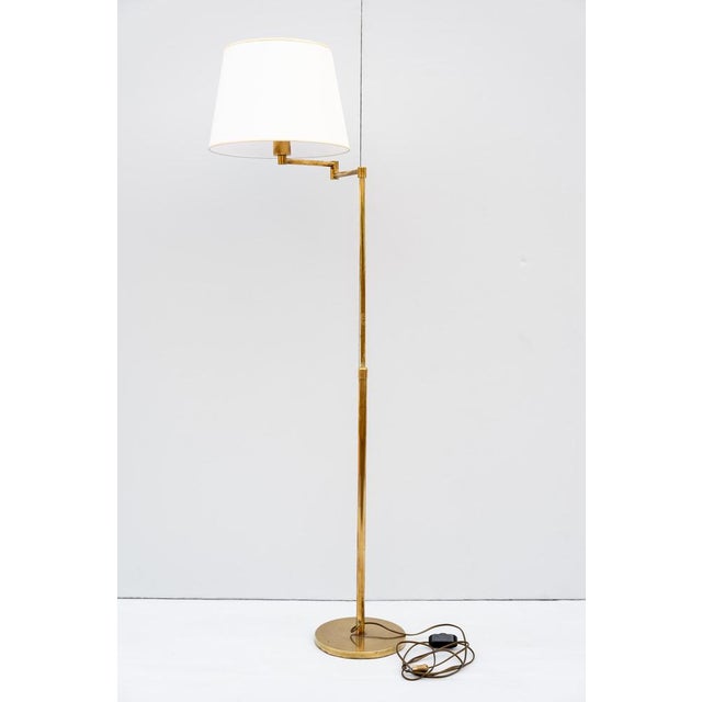 Brass floor lamp, made in italy, 1960s. This brass floor lamp is a classic italian design from the 1960s and has...