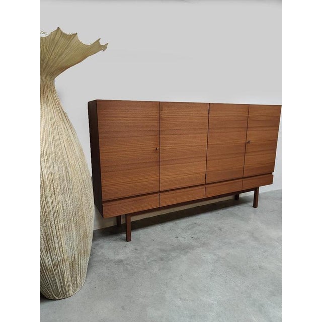 Sleek, warm, and timeless all at once. This beautiful vintage sideboard from the 1970s has exactly the minimalist look...