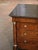 This elegant antique chest of drawers was crafted in France, circa 1870. With small proportions, and built of elm, the...