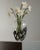 This vintage Italian glass vase from the 1970s is an elegant combination of clear glass and sculptural metalwork. Its...
