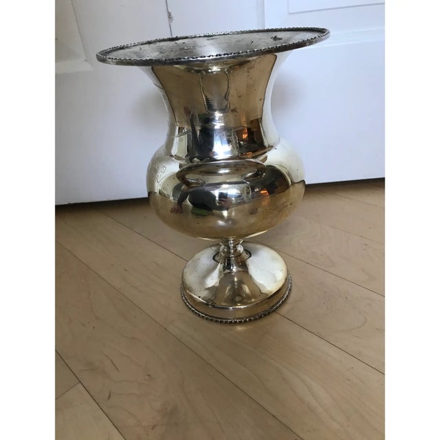 Silver plated trophy with tarnish that can be polished. Stamp appears to say "Mexico plateado".
