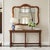 Elegant vintage French Provincial wall mirror featuring a gracefully shaped serpentine frame with carved shell crest...
