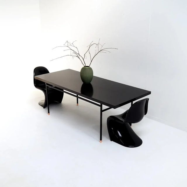 Stunning black dining table attr. to French modernist designer Paul Geoffroy. For me, this table is a beautiful...