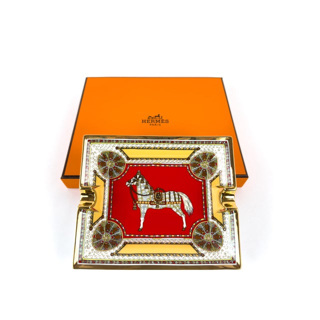 This Hermès Paris porcelain ashtray features an earlier interpretation of the Cheval d’Orient (“Horse of the Orient”)...