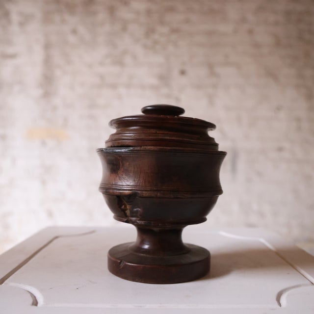 Add rustic French charm and historical character to your space with this 19th century French wooden tobacco pot, a...
