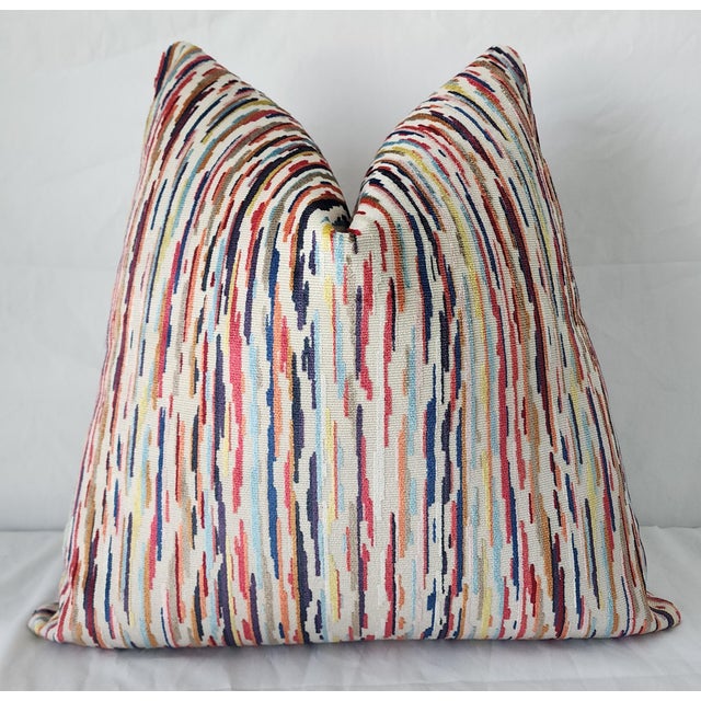 Pindler's Glenridge Multi fabric is a high-end designer textile known for its vibrant, painterly aesthetic and durable...