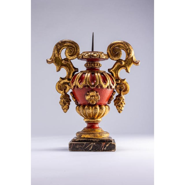 Pair of wooden Louis XV candelabra. Fantastic Pair of carved and gilded wooden palm holders. Terminating handles painted...