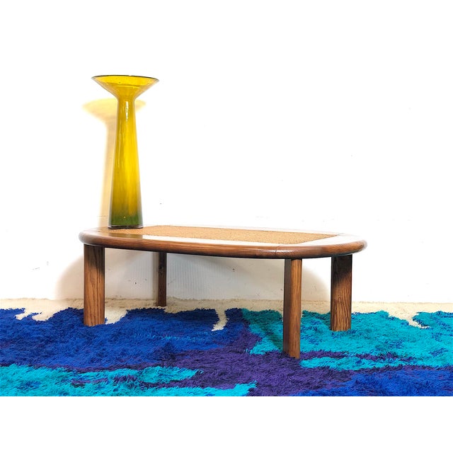 1960s Modern Coffee Table. The coffee table is of Italian manufacture from the 1960s, made of solid National Walnut wood...