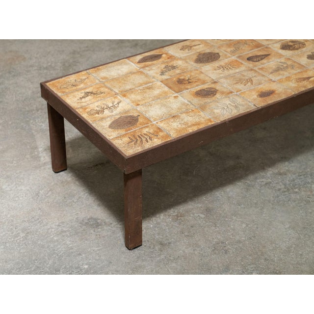 A beautiful ceramic coffee table designed by Roger Capron, created in the 1950s. Its top is made of ceramic tiles...