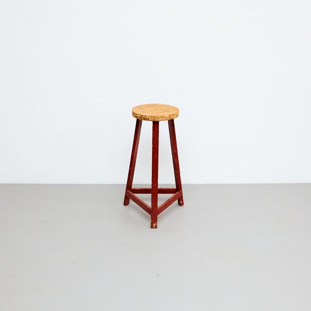 Mid-Century Modern Rationalist Wood High Stool, by unknown designer. Embrace the timeless style of this Mid-Century Modern...