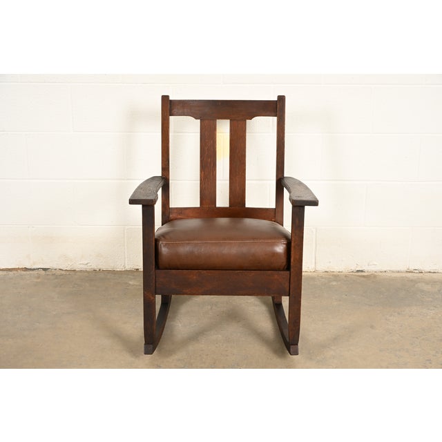 An exceptional antique Mission or Arts & Crafts period rocking chair By Charles P. Limbert Co. USA, Circa 1910 Solid...
