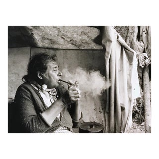 Vintage 1966 "Canadian Cree Woman Lights Her Pipe" Photograph by Paul S. Conklin For Sale