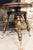 A rare Victorian swivel piano stool manufactured by the Melvin Bancroft Company of Lowell, Massachusetts, circa 1890. The...