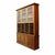 An impressive antique oversized two-piece country store cabinet, crafted from solid oak around 1910. This substantial...