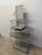 Handcrafted artisan made steel entry / foyer table or vanity with adjustable mirror, 1990s. The upper portion comes off as...