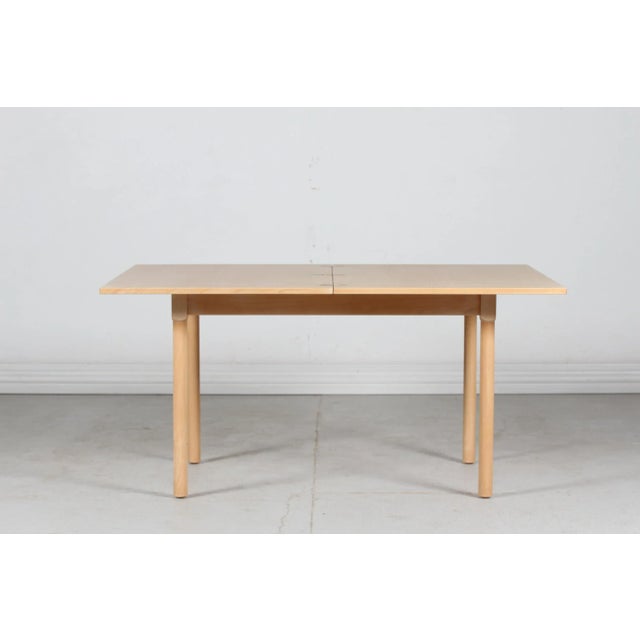 This model FH 4500 coffee table was made for the spoke back sofa by Børge Mogensen. It is made of solid and veneered beech...