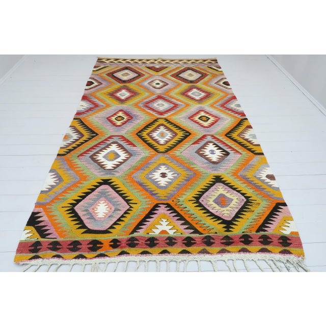 Vintage Turkish Kilim Rug- 5′7″ × 9′6″ For Sale - Image 13 of 13