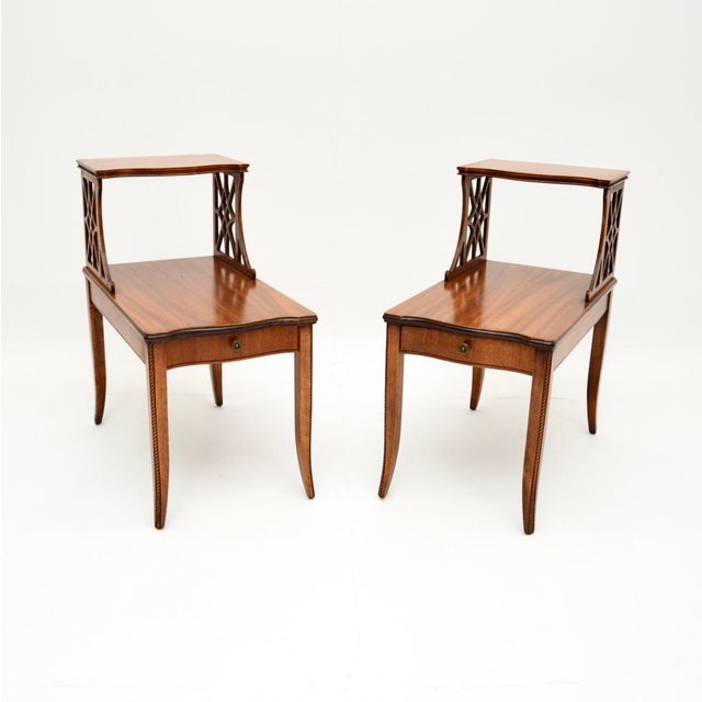 A beautiful and elegant pair of antique Regency style side tables. They are in the classic Regency style, they were made...