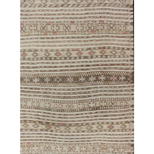 Measures: 6'9 x 8'10. Vintage Turkish Kilim with Soft Taupe, Ivory, and Faded Pink Tribal Motifs. Keivan Woven Arts / rug...