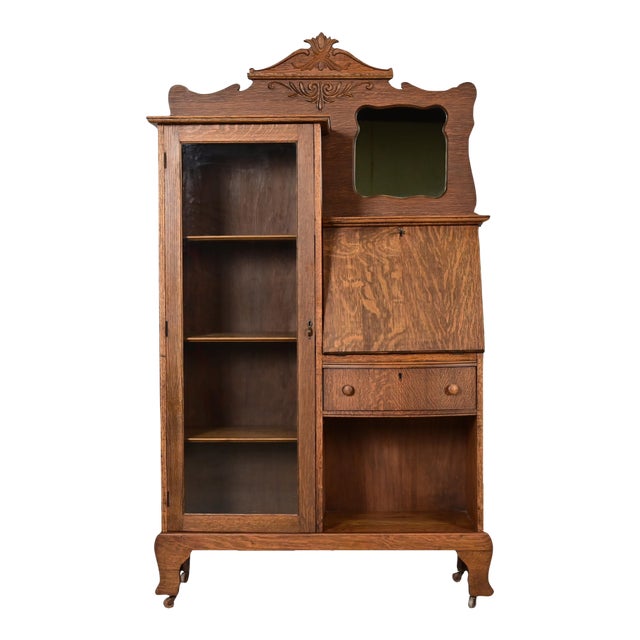 Antique Victorian Carved Tiger Oak Side-by-Side Bookcase With Drop Front Secretary Desk by Larkin Co., Circa 1900 For Sale