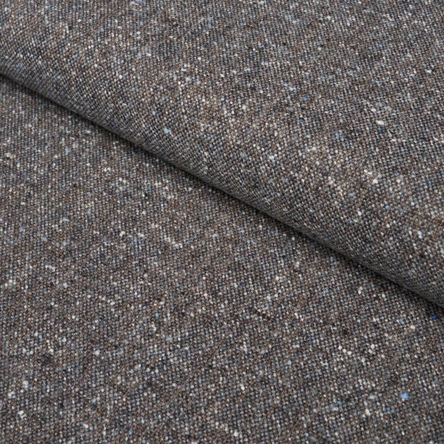Woven in Italy, Clarke Donegal Wool Blend is a timeless flecked tweed rooted in the tradition of Irish textile...