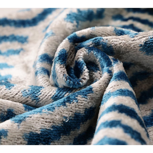 "A study in movement, texture, and timeless craftsmanship, this handmade silk velvet pillow brings an effortlessly...