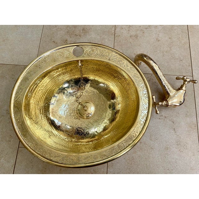 Set includes sink basin and faucet. Our majestic engraved Moroccan brass sink basins are handmade in the ancient city of...