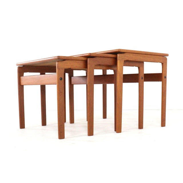 Set of 3 Teak Nesting Tables Minimalism at its finest. This set of three 'Made in Denmark' side tables is the definition...