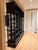This stunning two-way shelving unit in black steel is from the library and archives of the Pennsylvania State House from...