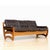 A striking 1970s leather sofa defined by its clean, architectural lines and low, grounded profile. The proportions are...