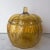 This large glass pumpkin bowl 7" tall with the lid and 7" in diameter at the widest point. It is a yellow glass piece and...