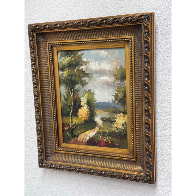 Design Plus Gallery presents a Signed Painting on Canvas in a Giltwood Frame. The frame is thick with intricate details....