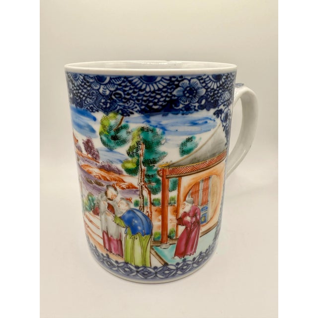 A finely painted Chinese export porcelain cider mug, dating to the Qianlong period (1736–1795), richly decorated in the...