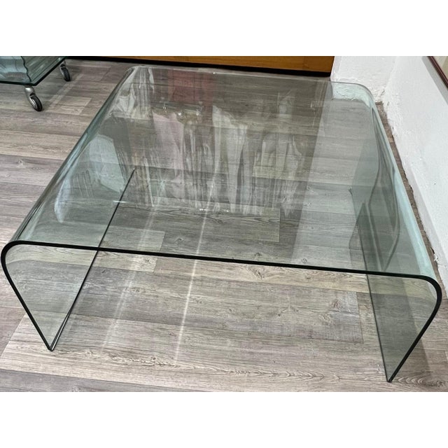 Fiam-pesaro square tempered glass coffee table good condition (small chip visible in photo) height: 40 cm length: 90 cm...