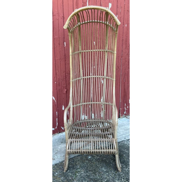 Mid century modern porter style hooded chair attributed to Franco Albini. Made of rattan and steam bent bamboo. This chair...