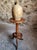 An antique French plant stand dating from around 1900. Crafted from solid walnut, this elegant guéridon features a...
