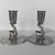 A pair of decorative Art Deco pewter candlesticks made in Sweden in 1931 by an unidentified manufacturer. Each candlestick...
