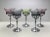 A beautiful collection of chrome stemmed glasses in a trio of complimentary colors, ideal for adding a unique note to your...